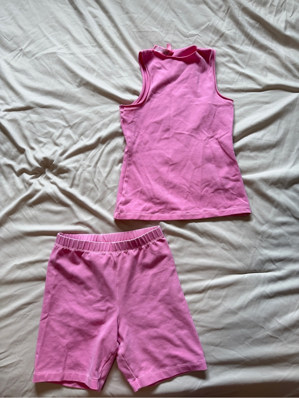 skims pink tank top and short set